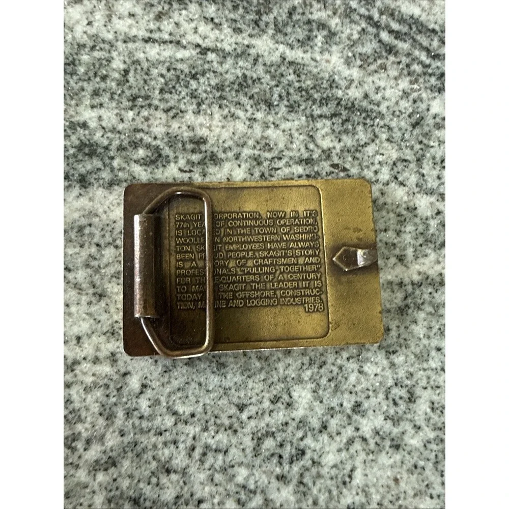 brass‎ belt buckle logos Bendix Corporation and Skagit Car Brake Equipment 1978